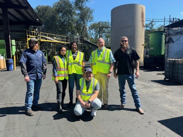 Amlon accounting team at processing facility